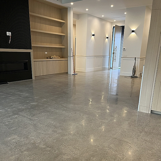High-gloss polished concrete flooring for a modern residential interior in Los Angeles