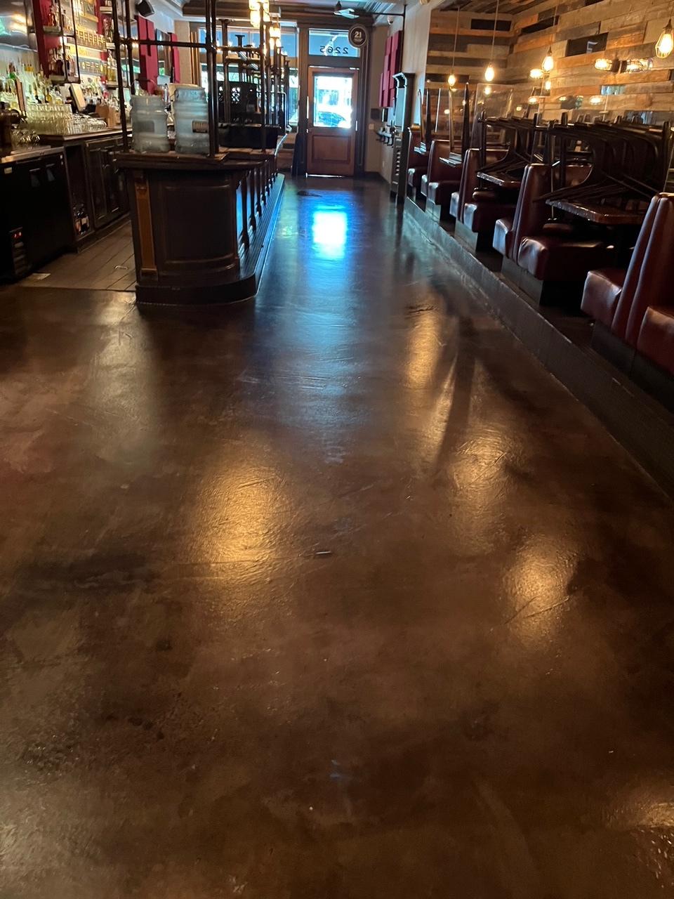 Epoxy flooring installation for a restaurant bar in Los Angeles.