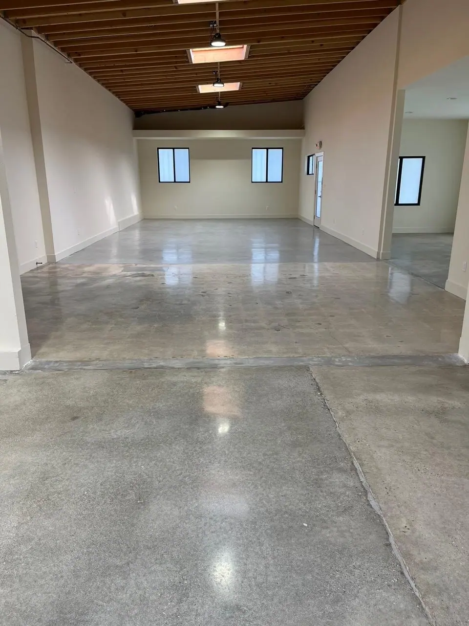 Concrete floor ground down to bare slab after coating removal