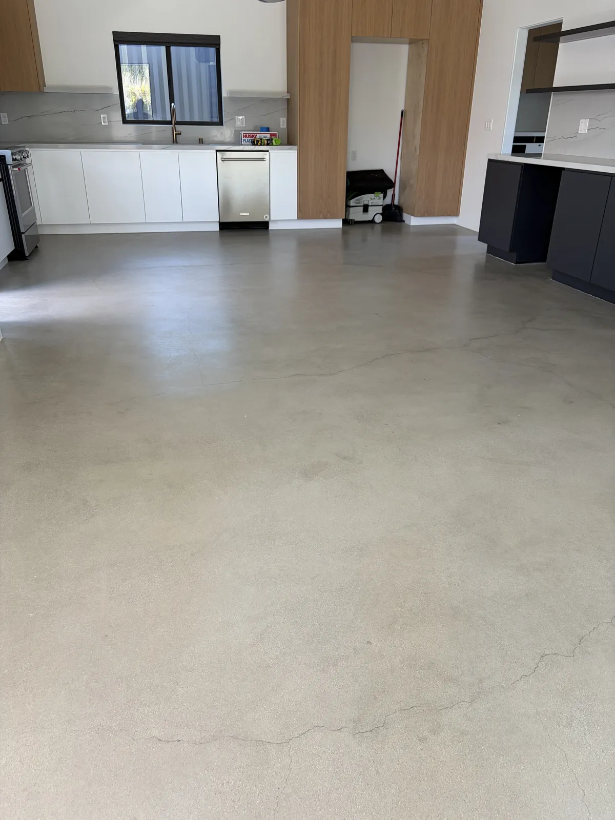 Polished concrete floor in a new ADU kitchen